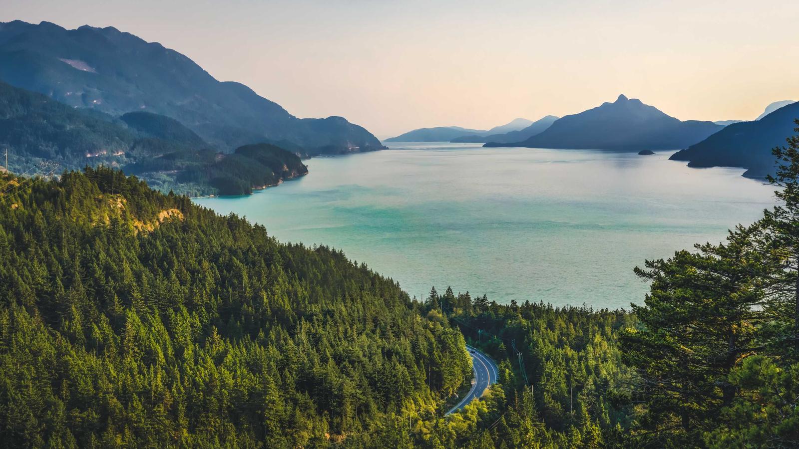 A laptop showing a colorful free-to-play game on screen