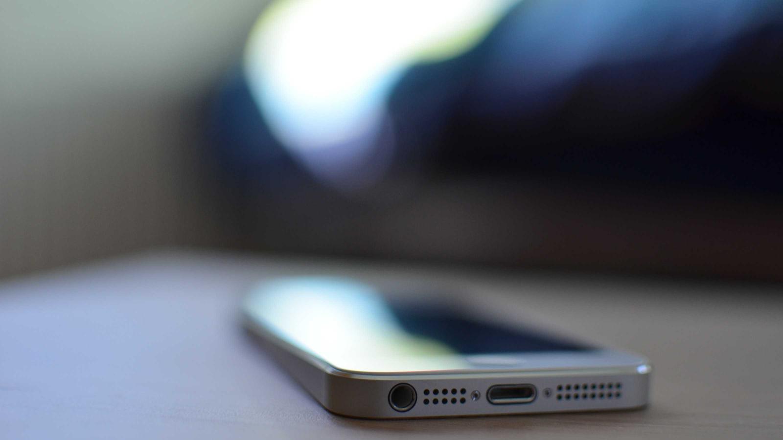 A clean desk with two trays labeled inbox and action