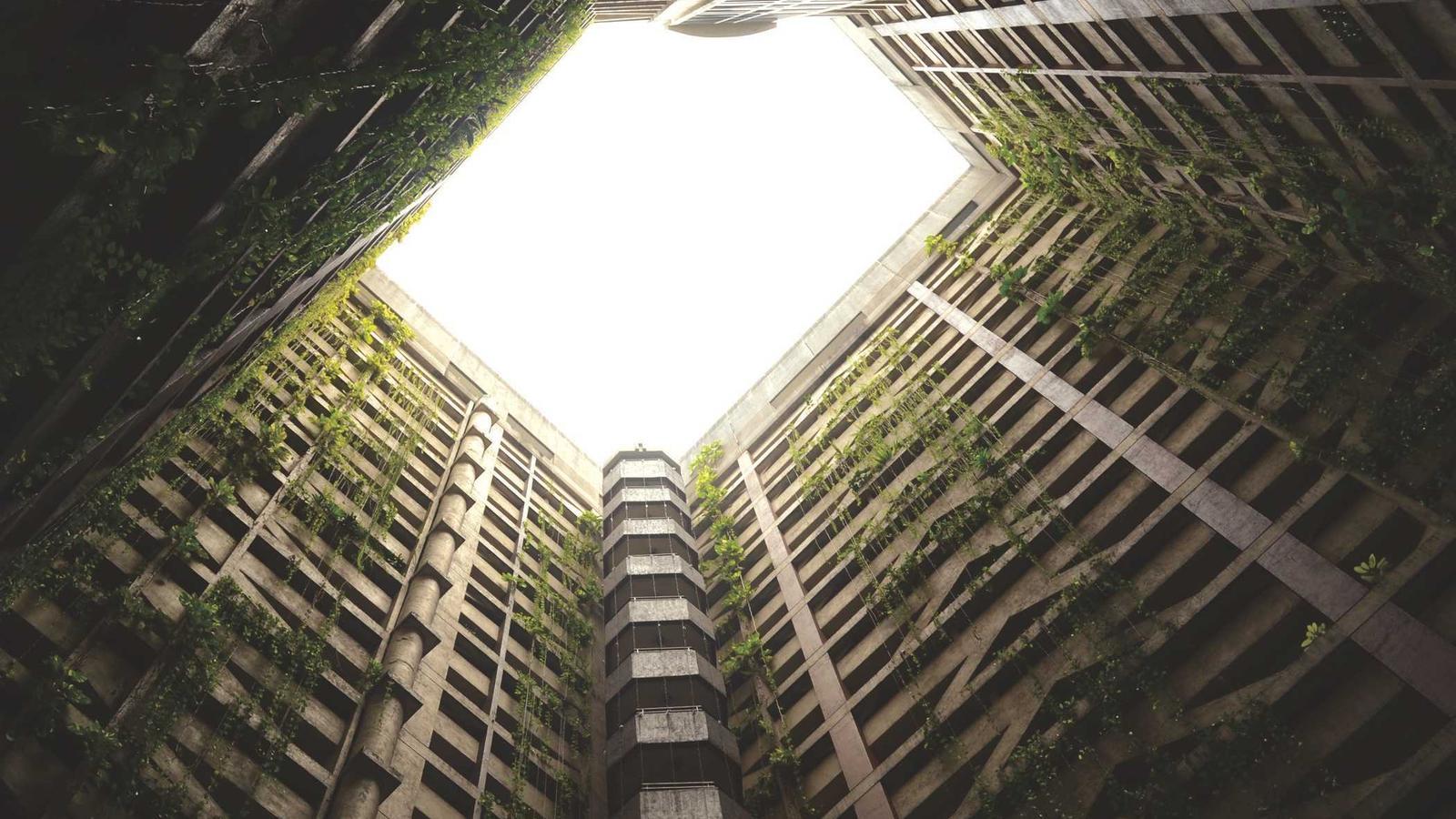 An organized refrigerator with clearly labeled containers and produce drawers